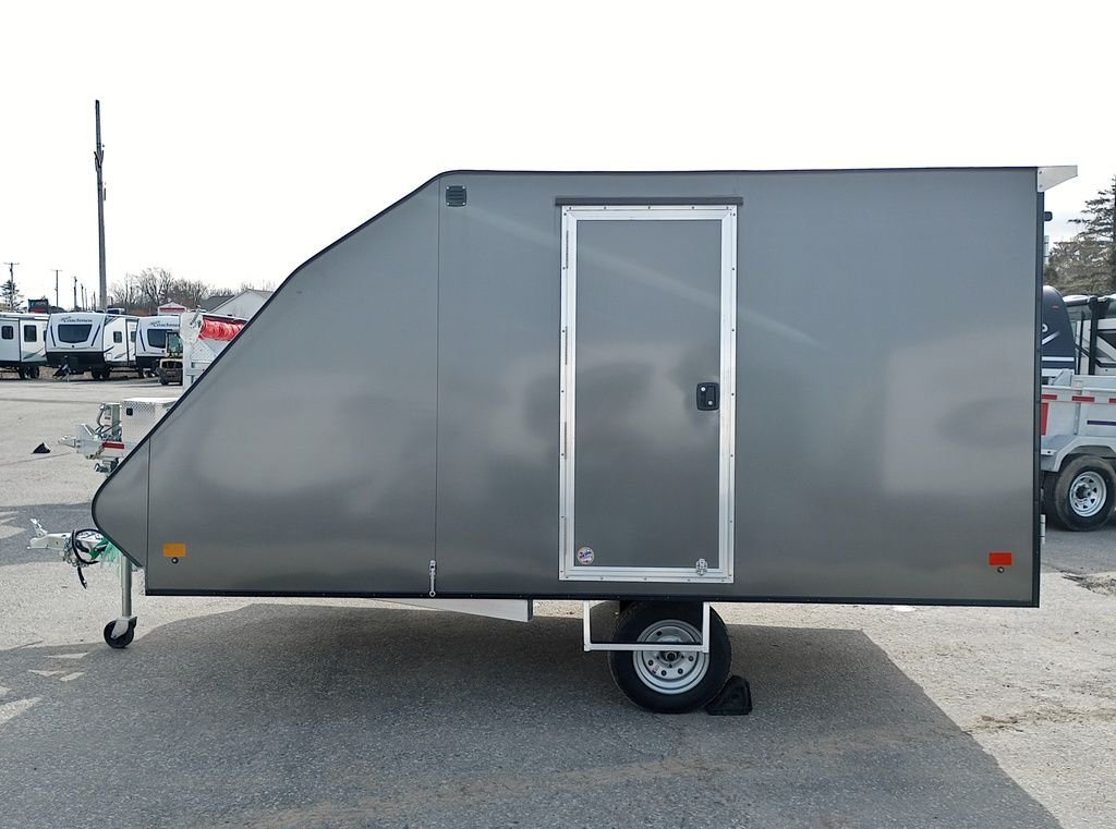 Mission Trailers Aluminum Crossover – Rear Canopy – Full side profile view of the charcoal gray crossover trailer with door