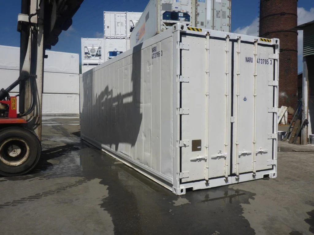30ft Customized Reefer Container – Mobile Freezer Storage – three-quarter exterior view of white container with cargo doors closed