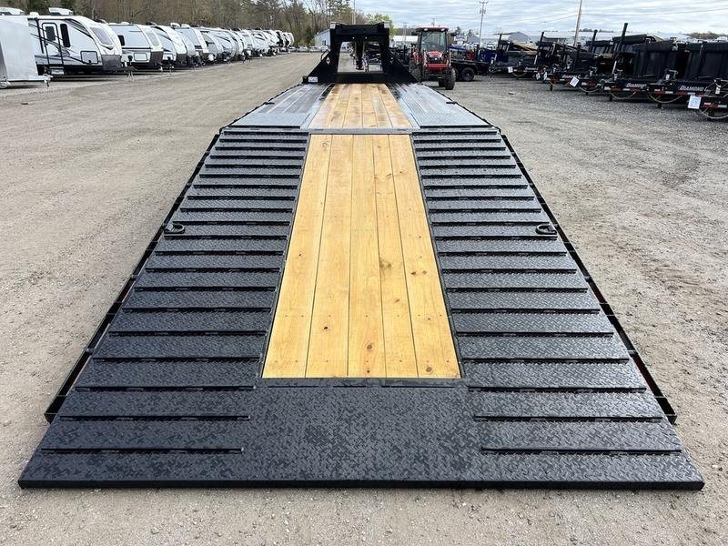 2024 Diamond C 35 ft Equipment Trailer – Auto Dovetail – A straight-on view from the rear looking up the trailer deck