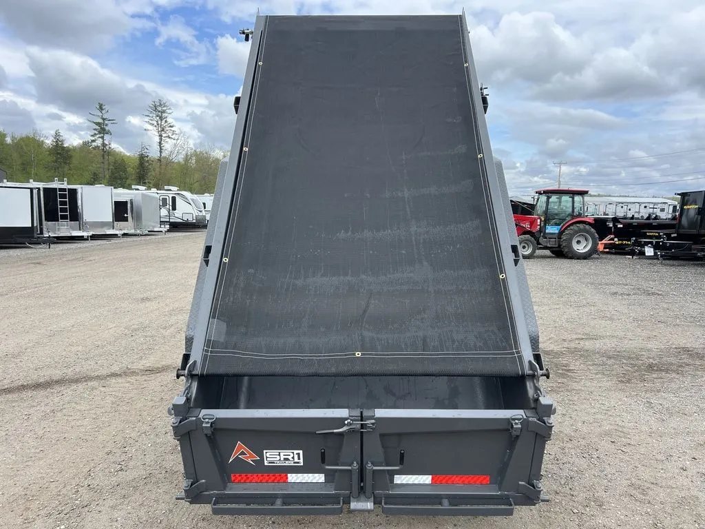 2024 RawMaxx 10 ft Dump Trailer – Shadow Grey – Direct rear view of the raised dump bed with the black mesh tarp fully extended