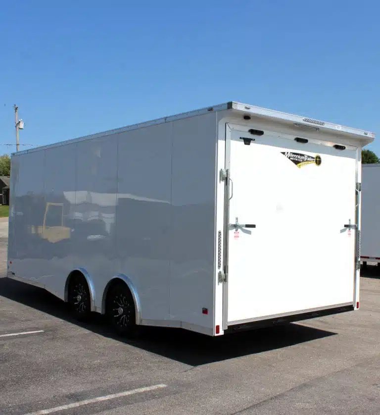 2025 Millennium Blaze 20 ft Enclosed Car Hauler – White – Rear angle of white enclosed trailer showing closed ramp door and tail lights