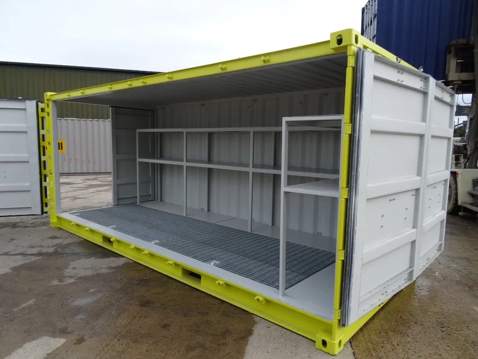 20ft Bunded Storage Container – Integrated Spill Containment – open-sided storage container with shelving and grated floor