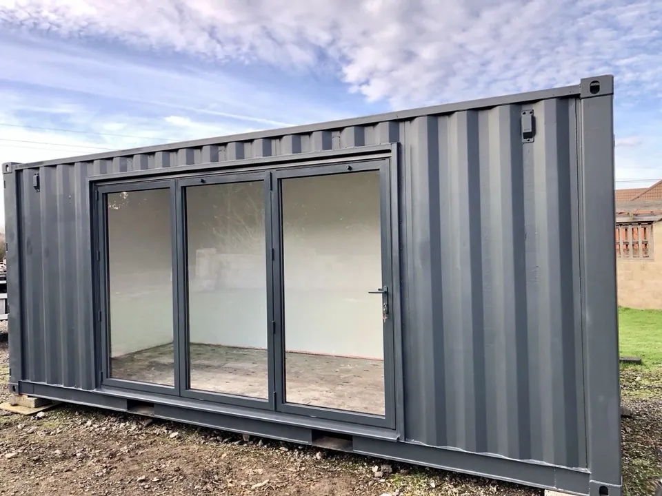 20ft Converted Container Office – Private Gym Configuration – grey converted container exterior with large glazed folding doors