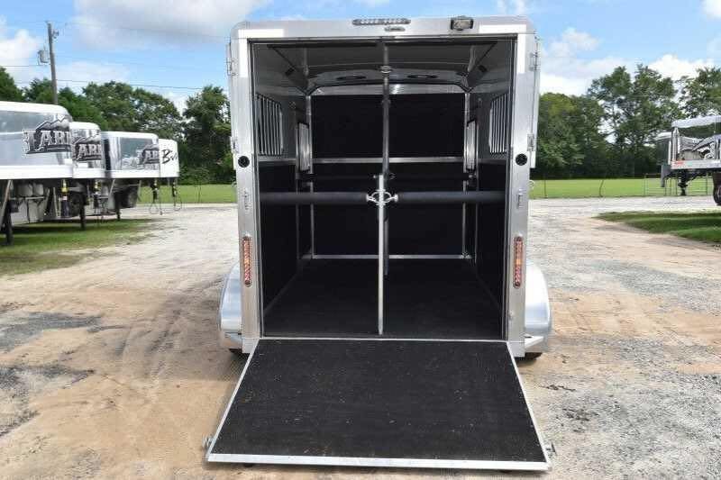 2016 Shadow 2 Horse Trailer – Aluminum, Dressing Room – Rear view showing the trailer interior with the loading ramp lowered down