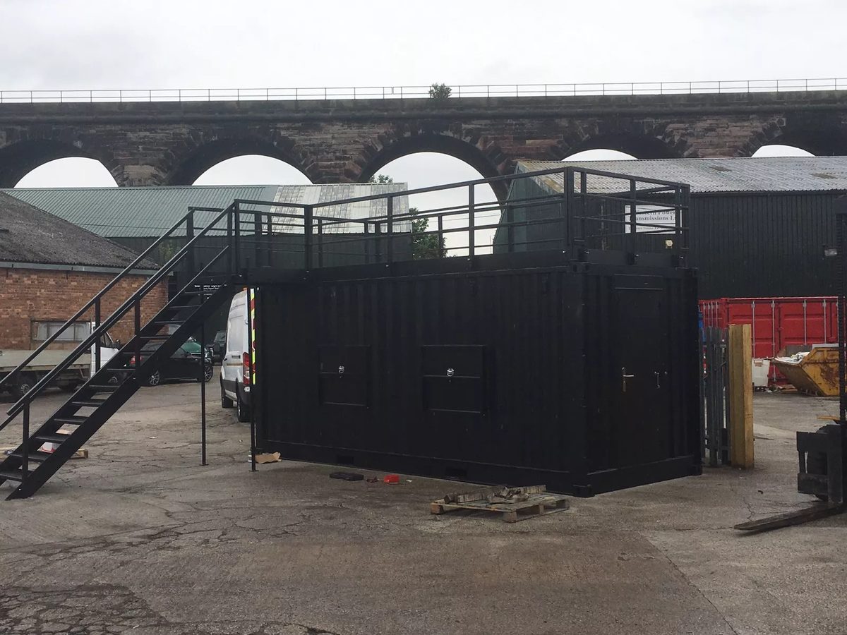 20ft Converted Shipping Container – Serving Hatches and Roof Deck – black converted container with rooftop terrace and external staircase (6)