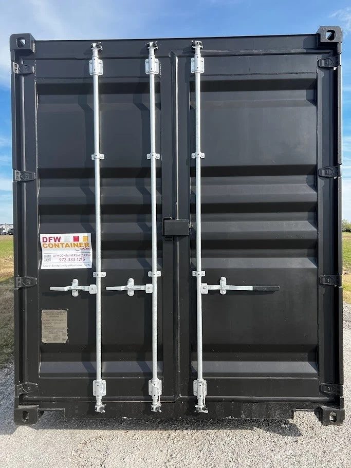 40ft Modified Shipping Container – Three Roll-Up Side Doors – straight-on view of closed cargo doors with silver locking bars