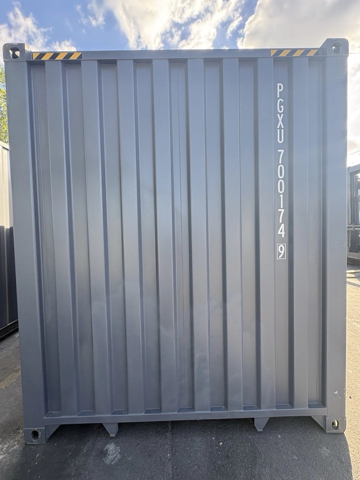 40ft High Cube Shipping Container – New / One-Trip – straight-on exterior view of corrugated container end wall