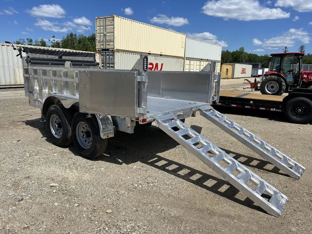 2024 Cargo Pro 12 ft Dump Trailer – Aluminum – Side rear view showing the loading ramps extended from the open gates
