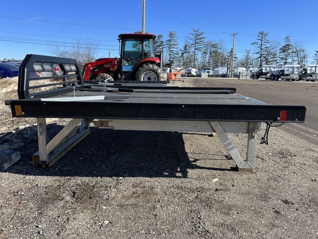 2023 Sno Pro 8 ft Sled Deck – Sliding Sides – Full side profile view of the sled deck on its stand