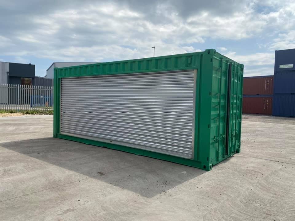 20ft Refurbished Storage Container – Side Roller Shutter – green container with closed silver roller shutter and end doors