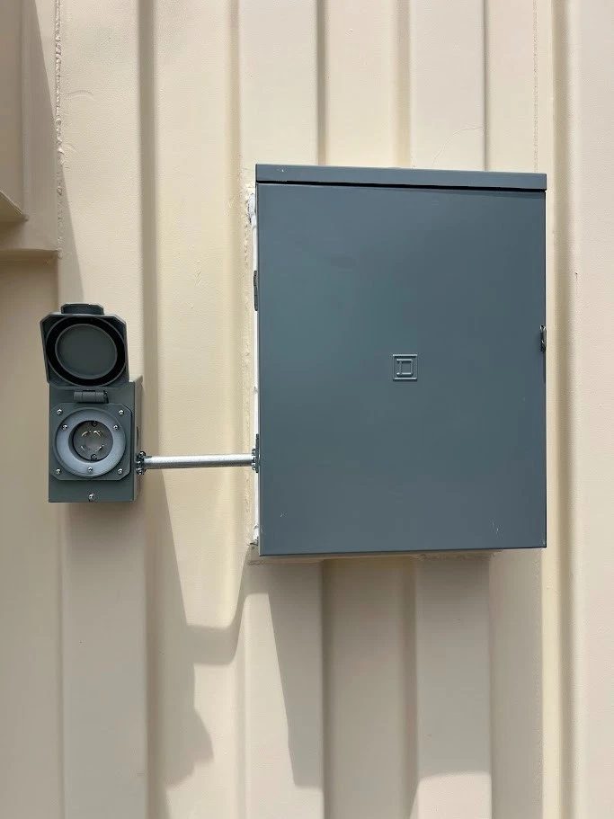 20ft High Cube Container Office – Side Entry and Two Windows – exterior electrical panel and power inlet on corrugated wall