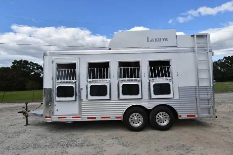 2018 Lakota 4 Horse Trailer – 2 ft Short Wall – Left side view with feed windows open and bars visible