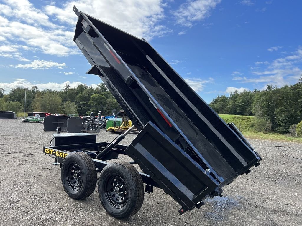 2024 Griffin Trailers 10 ft Dump – Barn Door Gate – Side view of the dump trailer with the bed raised at a steep angle