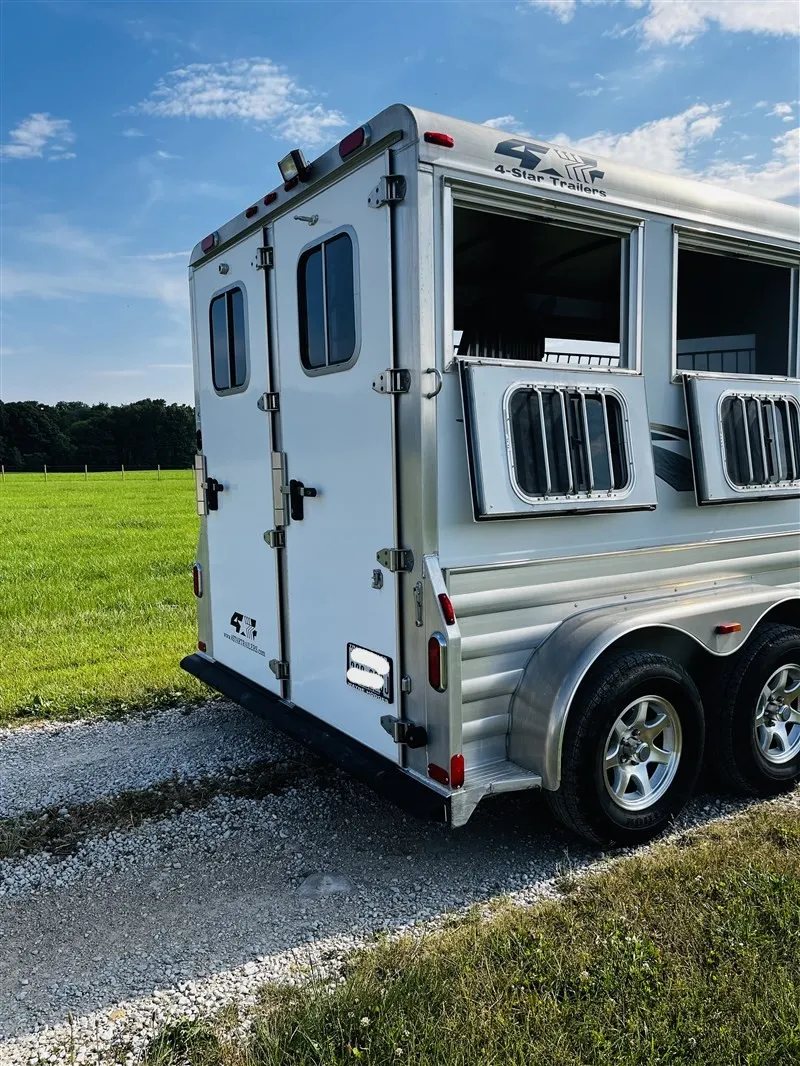 2015 4 Star 2 Horse Bumper Pull – Slant Load, Rear Tack – Rear three-quarter view showing the double rear doors and side windows