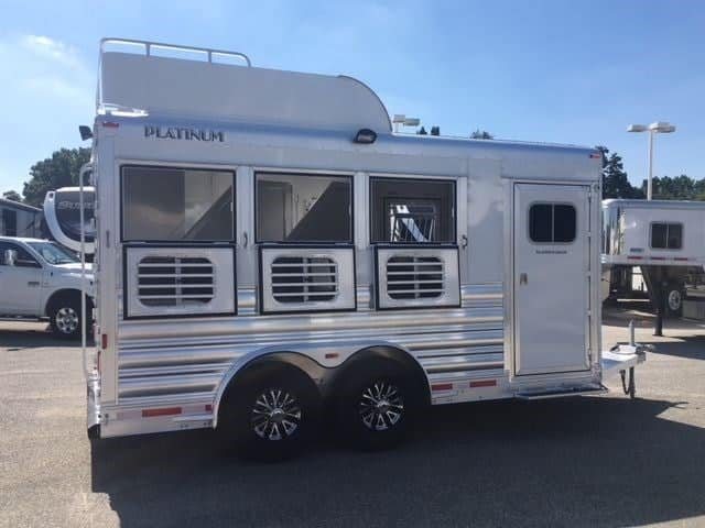 2018 Platinum Coach 3 Horse Bumper Pull – Rear Tack – Profile view of the street side showing the aluminum wheels and hay rack