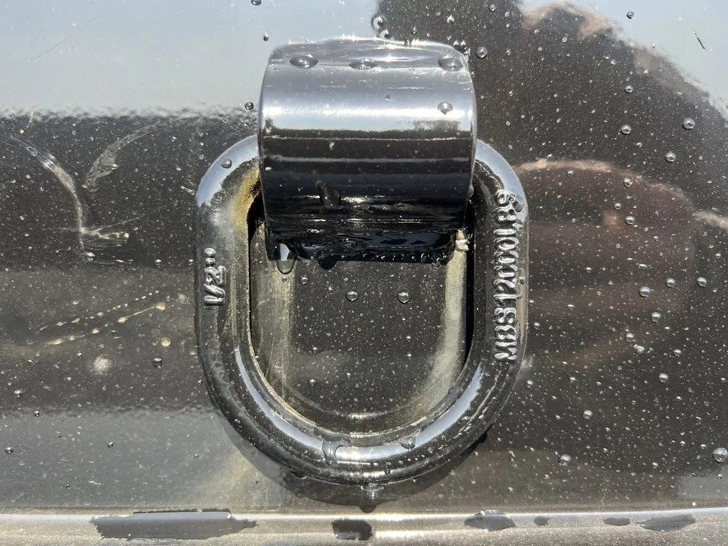 2024 Griffin Trailers 16 ft Dump Trailer – Telescopic – A close-up of a heavy-duty recessed D-ring tie-down point
