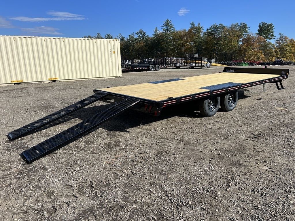 2024 Diamond C 20 ft Deckover – Slide-In Ramps – Rear perspective of the deckover trailer with both mesh ramps deployed