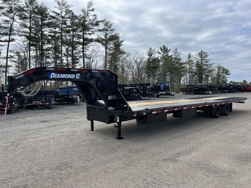 2024 Diamond C 35 ft Equipment Trailer – Auto Dovetail – A black gooseneck equipment trailer shown at a three-quarter front angle