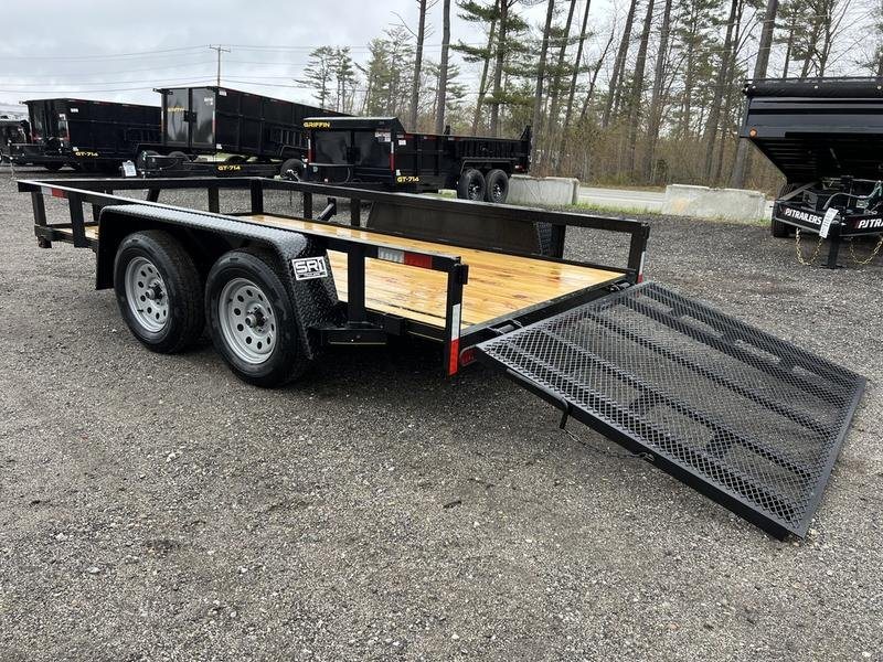2024 Reiser Trailers 12 ft Landscape Trailer – Ramp Gate – Rear three-quarter view of the trailer with the mesh ramp gate lowered to the ground