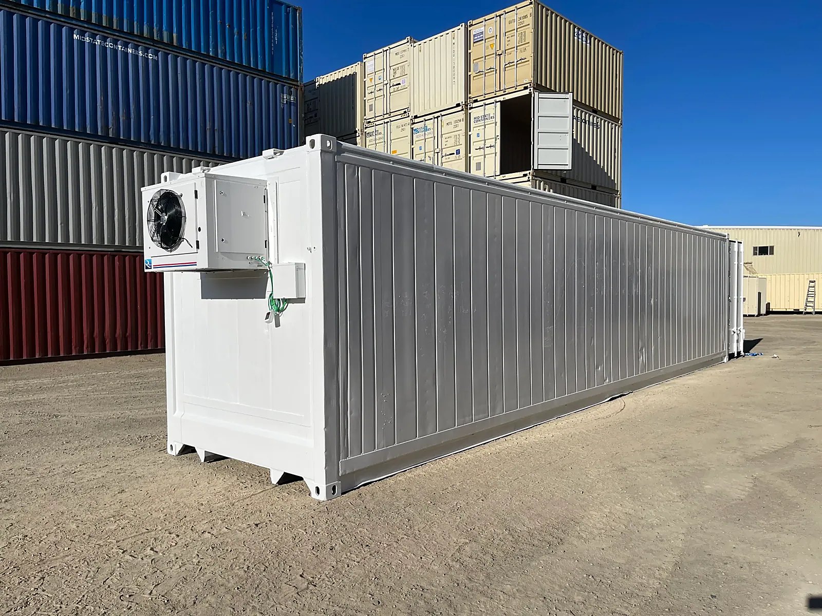 40ft Used High Cube Reefer – New 5HP Single-Phase Motor – three-quarter exterior of white container with mounted refrigeration unit