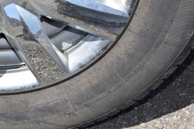2004 Dalton 2 Horse Bumper Pull Trailer – Aluminum, Straight Load – Close-up view of the trailer tire showing the specific tire size markings