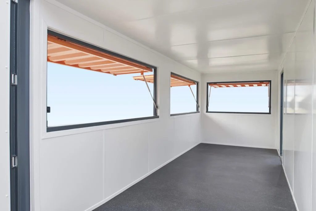 20ft Custom Container Café – Configurable Food Service Layout – empty white interior with three open serving hatches
