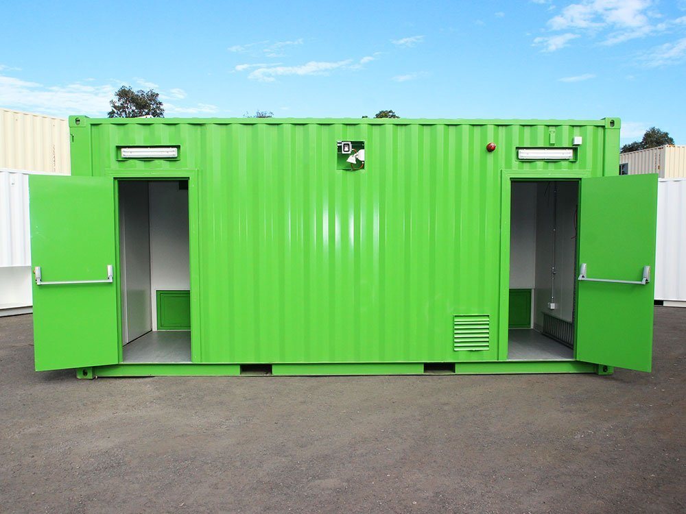 20 ft Switch Room Container – Insulated Panels – Bright green specialty container with two open doors showing interior entry points and light fixtures