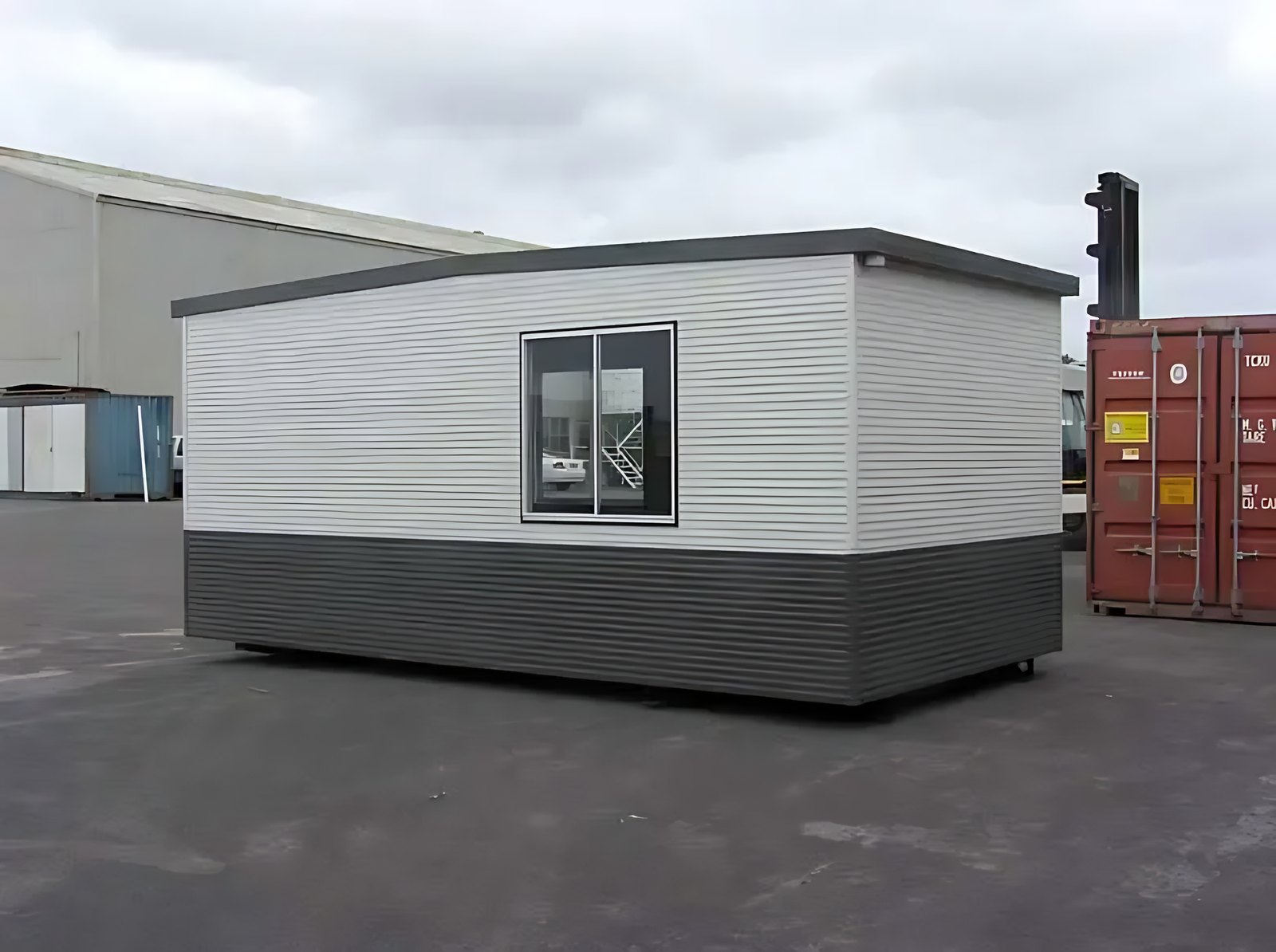 Custom Portable Steel Building – Office, Workshop or Storage – three-quarter exterior of portable steel building with single window