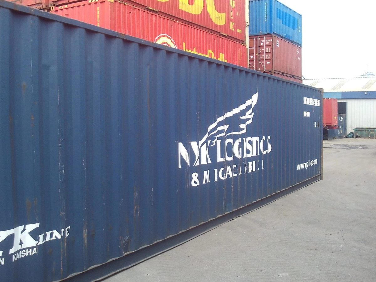 40ft Used Shipping Container – Standard Height, Double Doors – angled side view of blue container in stacked container yard