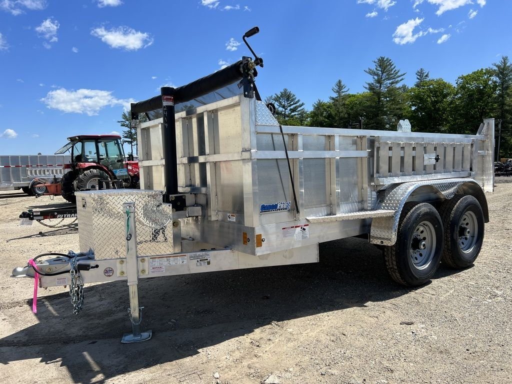 2024 Cargo Pro 12 ft Dump Trailer – Aluminum – Front three-quarter view of an aluminum dump trailer with a diamond plate toolbox