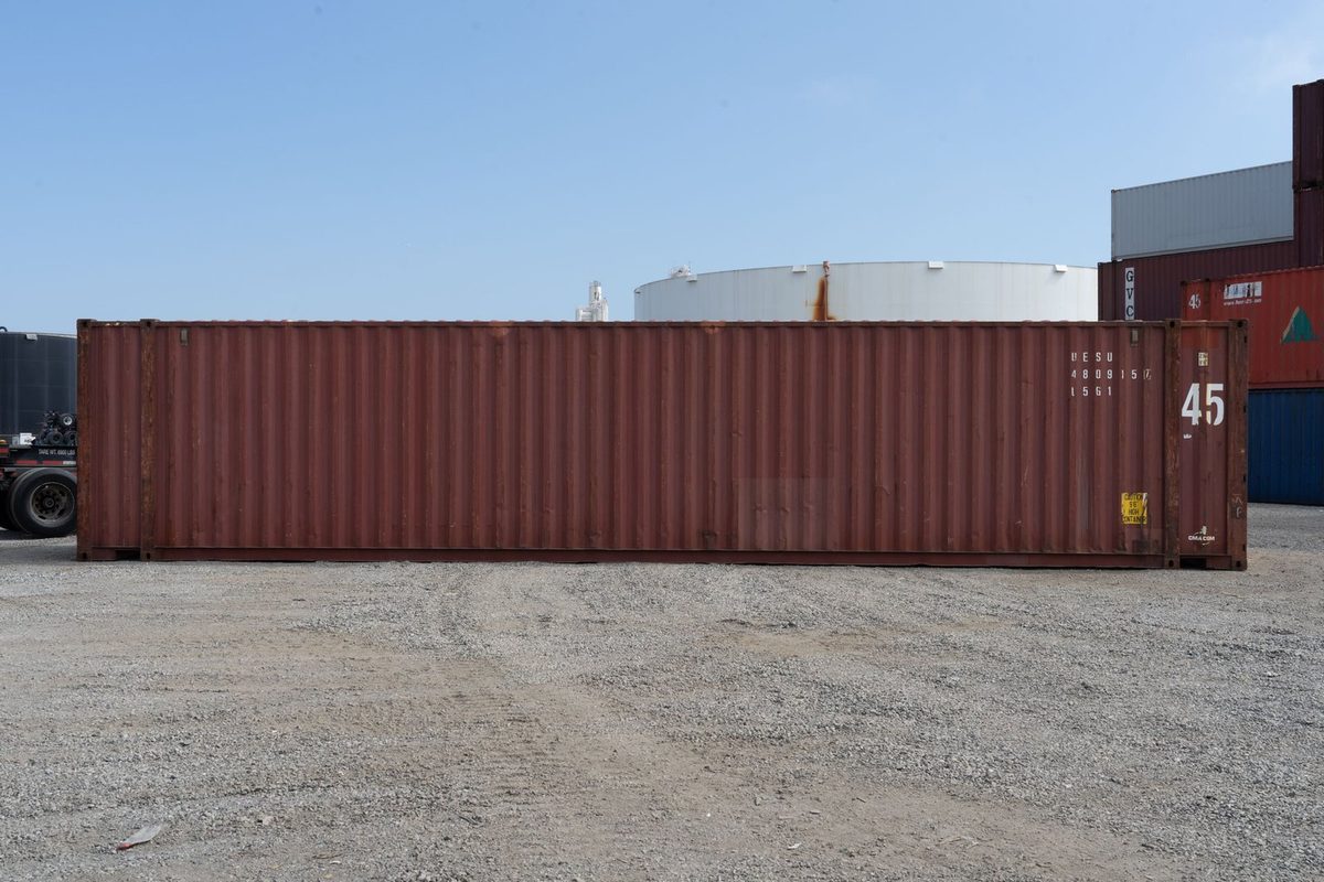 45ft High Cube Shipping Container – Used, Cargo Worthy – full side view of weathered container in storage yard