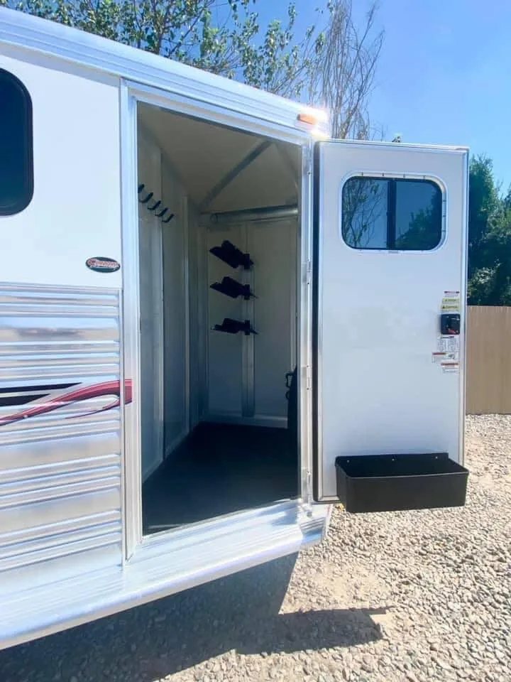 2011 Cimarron 3 Horse Bumper Pull – Insulated Roof – View looking into the open tack room door from an angle