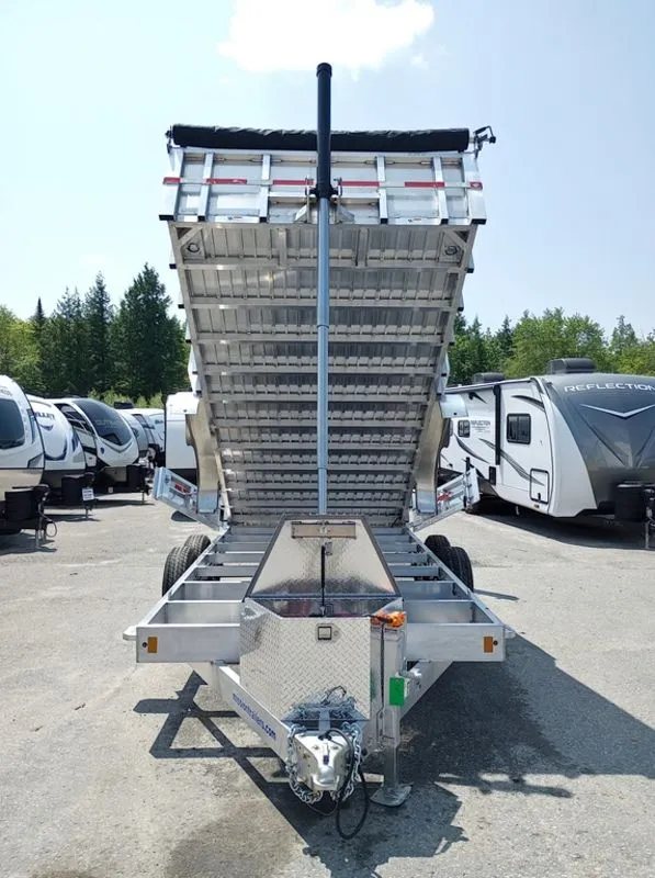 2025 Mission Trailers 16 ft Dump Trailer – Aluminum – Front view of the raised dump bed and the hydraulic cylinder mechanism