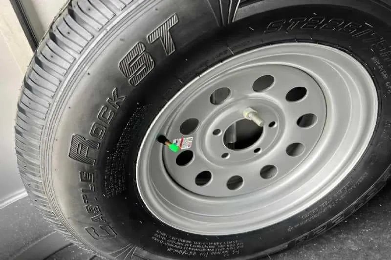2023 Shadow 2HSSR 2 Horse Trailer – Extended Box – Close up of silver trailer wheel and tire assembly