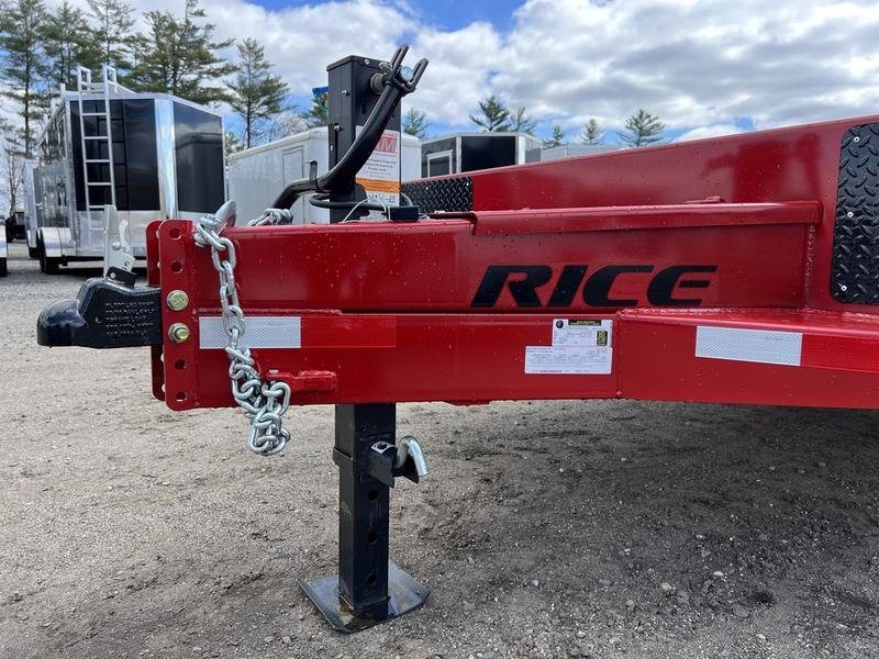 2024 Rice Trailers 22 ft Tilt Deck – Red, Toolbox – Close-up side view of the trailer hitch, safety chains, and jack