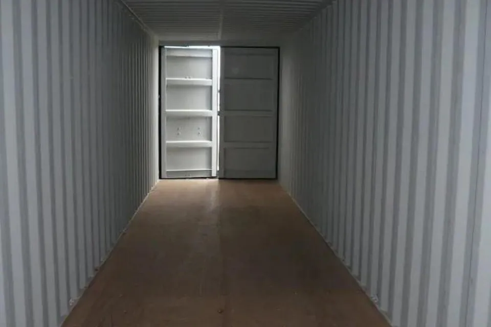 40ft New Tunnel Shipping Container – Dual-End Doors – empty container interior with wooden floor and far end doors