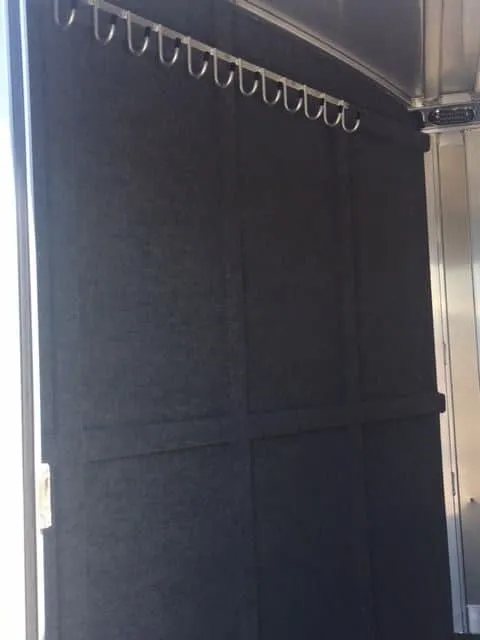 2018 Platinum Coach 3 Horse Bumper Pull – Rear Tack – Close up of the bridle hook rack on the carpeted interior wall