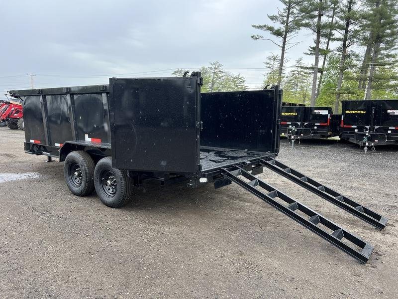 2024 RawMaxx 16 ft Dump Trailer – Tarp Kit – Alternate rear angle showing the open bed and extended loading ramps