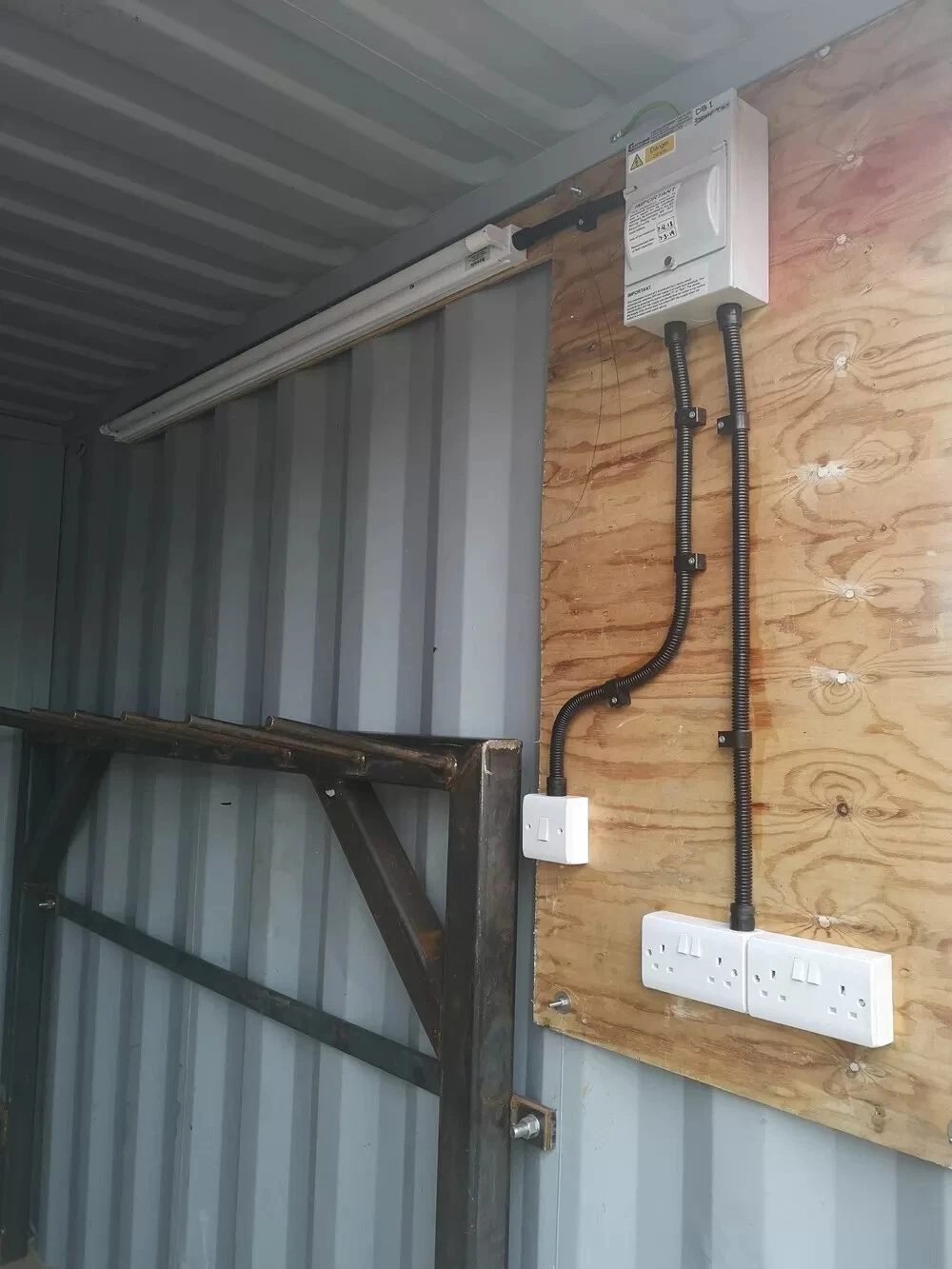 10ft Bespoke Steel Storage Container – Rigging Loft & Tackle Store – Interior electrical panel, sockets and strip light beside steel framework