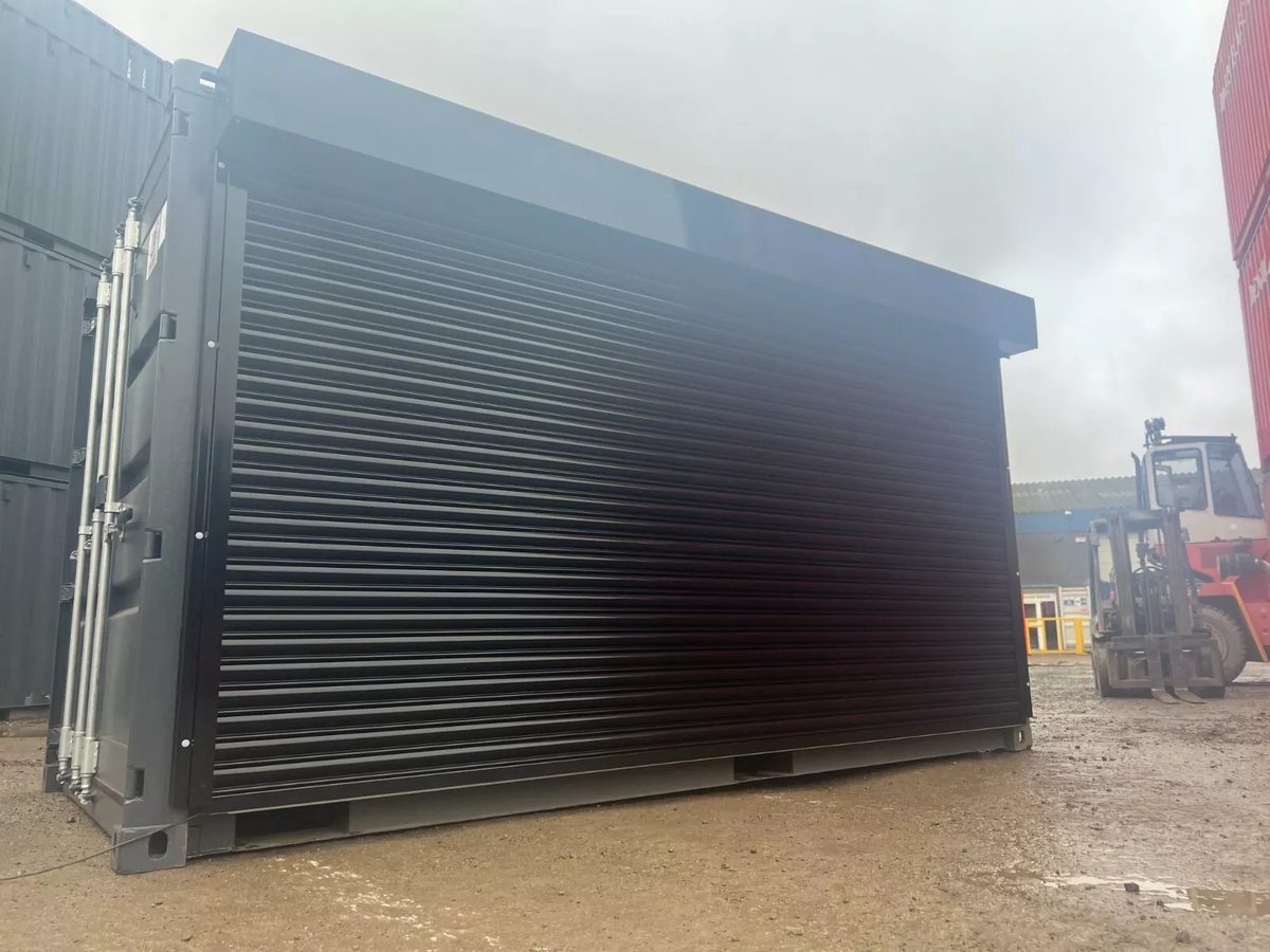 20ft One-Trip Shipping Container – Electric Roll-Up Side Door – three-quarter exterior view with full side roll-up door closed