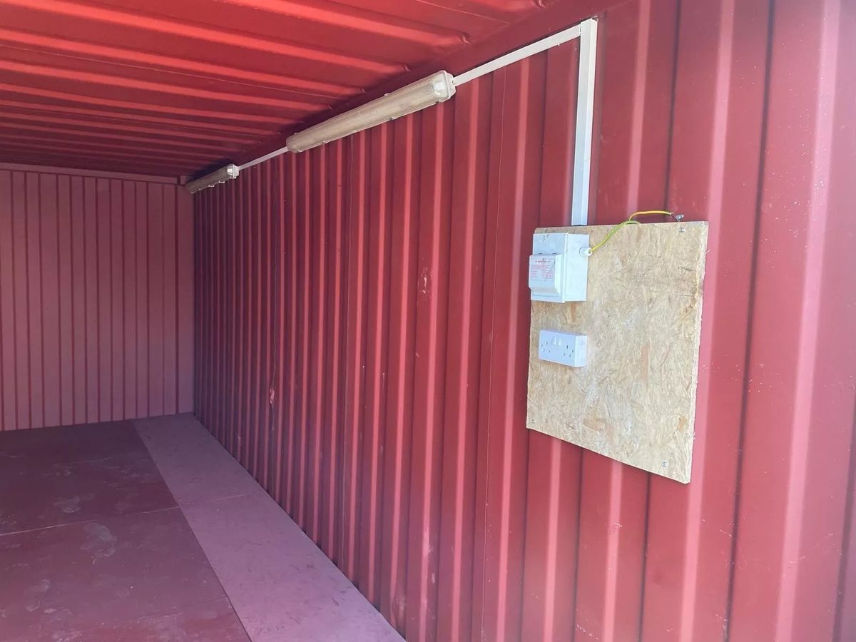 20ft Refurbished Storage Container – Anti-Vandal Doors – Empty container interior with strip lights and electrical sockets