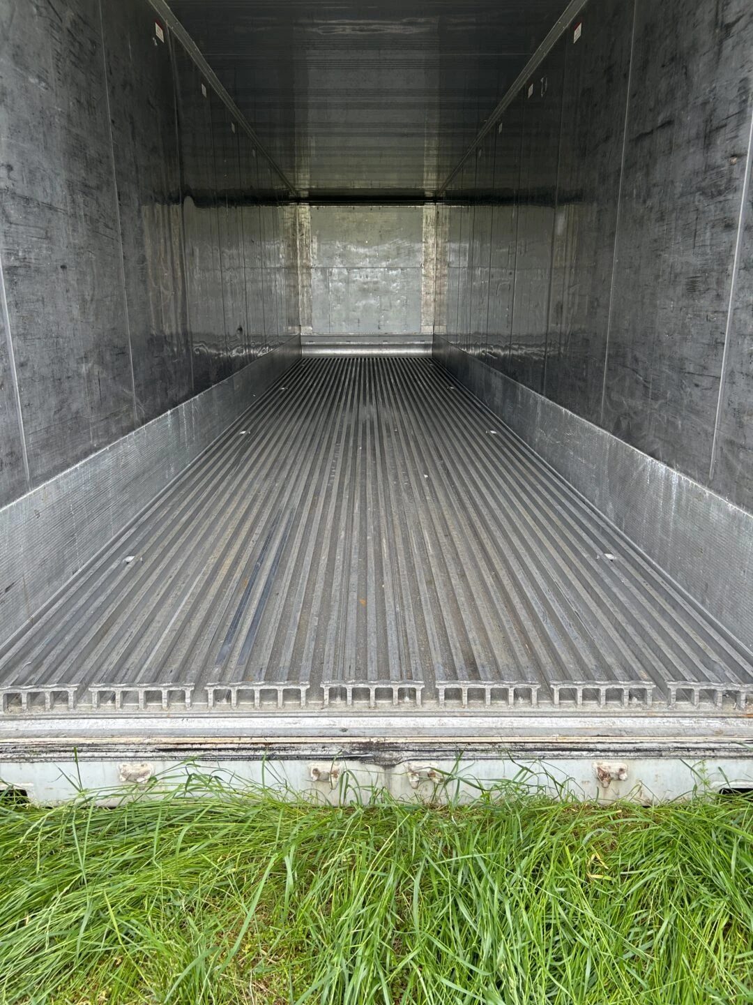 40ft High Cube Refrigerated Container – Insulated Storage – empty refrigerated container interior with ribbed metal floor