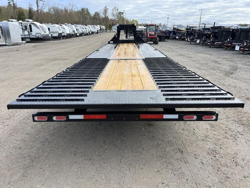 2024 Diamond C 35 ft Equipment Trailer – Auto Dovetail – Rear view of the trailer showing the wood deck and tail lights
