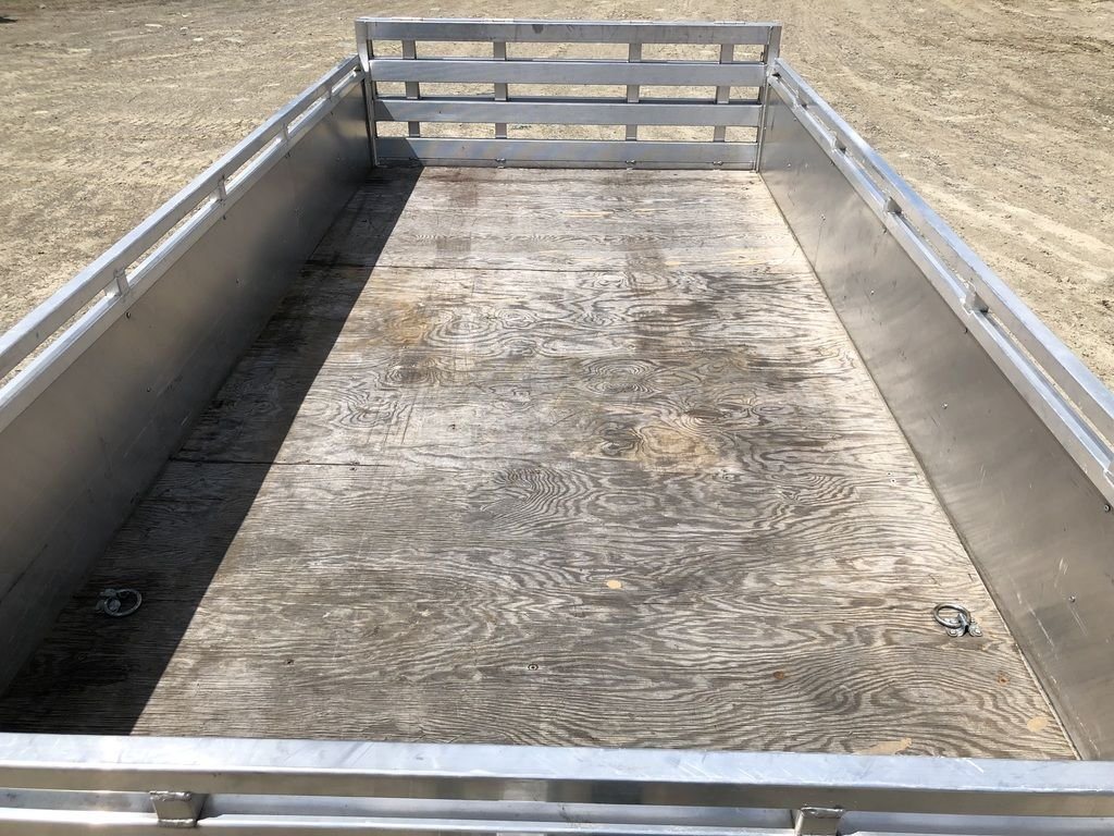 2022 Mission 6 × 12 ft Utility Trailer – Rear Ramp – Interior view of the wooden floor and aluminum side walls of the utility trailer