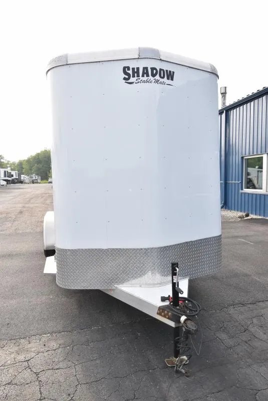 2021 Shadow 3 Horse Trailer – Fold-In Tack Wall – Front nose of the white horse trailer with diamond plate gravel guard