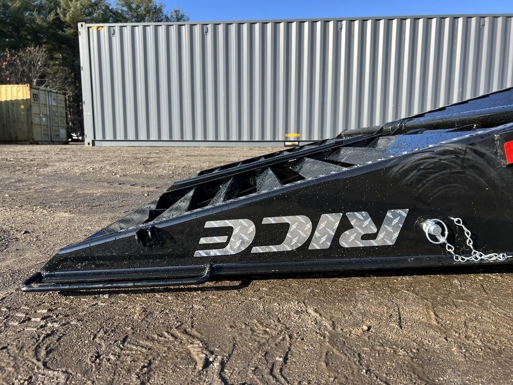 2024 Rice Trailers 18 ft Equipment Trailer – Hydraulic Jack – Side profile of the folded metal ramp at the rear of the trailer