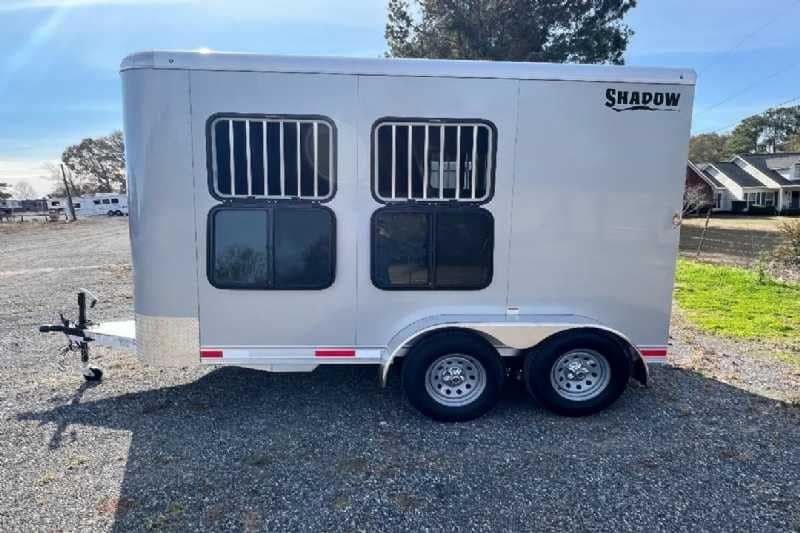 2024 Shadow 2 Horse Bumper Pull Trailer – Aluminum, Dressing Room – Full side view of the trailer showing both windows and double axles