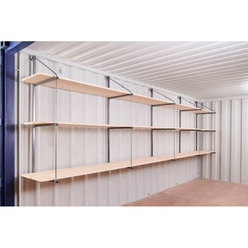 Fastfit Three-Tier Container Racking – Single Bay – Three tier wooden shelving units mounted on the interior wall of a shipping container