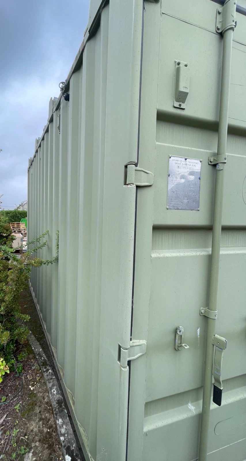 13ft Used Shipping Container – Lock Box Storage – close angled view of container door and side wall