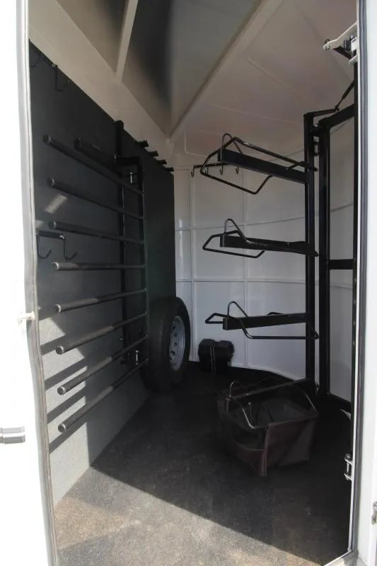 2019 Trails West 4 Horse Trailer – Convenience Package – Tack room interior with saddle racks and blanket bars installed